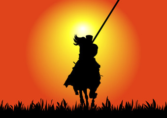 Horse riding warrior at sunset