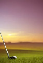 Washable Wallpaper Murals Golf hitting golf ball along fairway at sunset