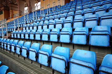 Fototapeta premium Blue Seats On Stadium