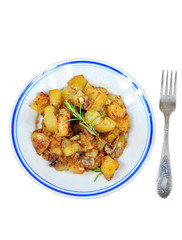 Dish from country style roasted potatoes, isolated