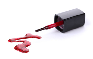 red nail polish and brush isolated on white