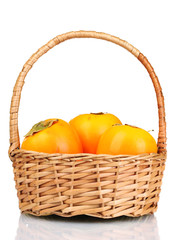 Appetizing persimmons in pad isolated on white