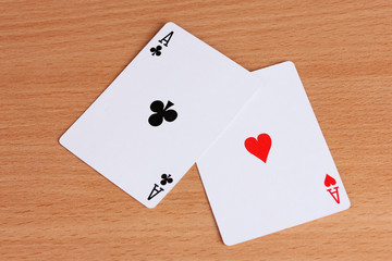 Two cards on wooden background