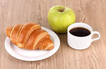 Classical breakfast. Coffee and croissant