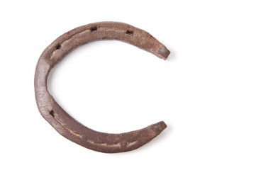 Lucky horseshoe isolated on white, copyspace
