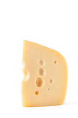 Piece of Maasdam cheese, isolated over white