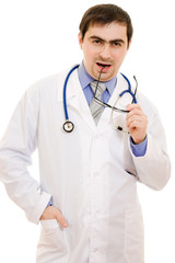 A doctor with a stethoscope and glasses thinking