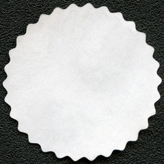The reverse side of a postage stamp