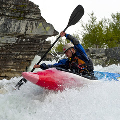 Kayaker in the waterfall