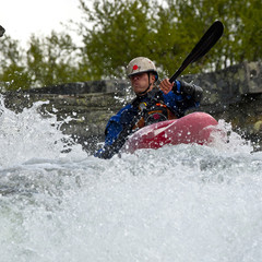 Kayaker in the waterfall
