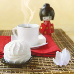 White day. Zephyr with the cup of coffee and doll in the Japanes