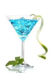 Blue cocktail in martini glasses with ice isolated on white