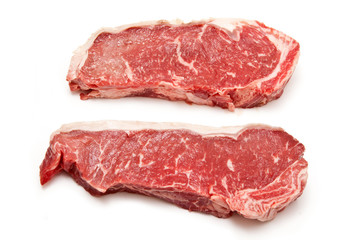 Sirloin steaks (beef) on a white studio background.