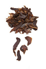 Sticed biltong isolated on a white studio background.