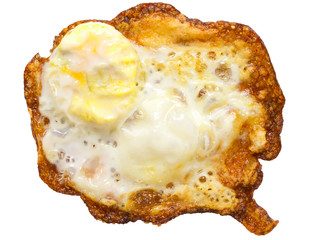 close up of a burnt fried egg