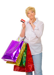 Senior woman with bags and credit card