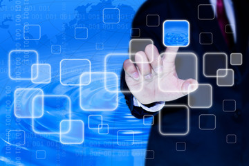 hand of business man pushing a button on a touch screen interfac
