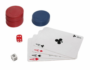 Four aces playing cards,  red dice and  casino counters