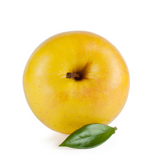 yellow ripe juicy apple with a leaf