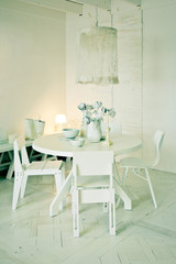 stylish white dinner table