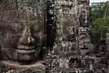 Ancient faces Angkor temple