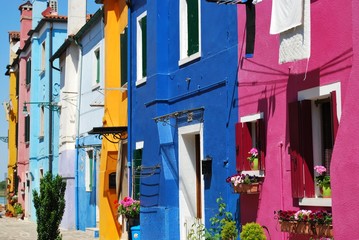 Colorful houses on the canals in Burano Island, Venice, Italy