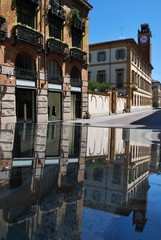 Reflection of ancient buildings, Novara, Piedmont, Italy