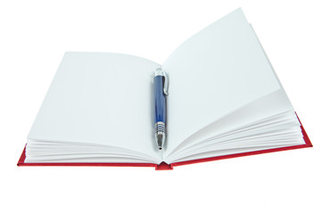 Blank opened book with pen