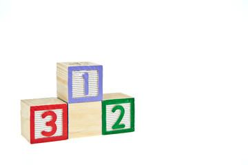 number 123 from letter wooden blocks as a podium