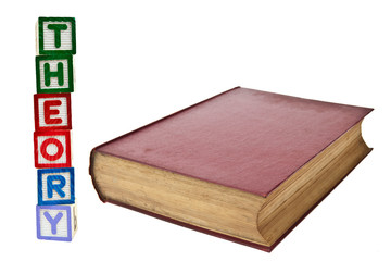 Old book with letter blocks theory isolated on white background