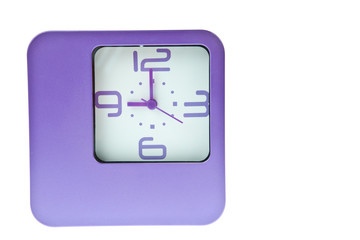 Violet table clock at 9 o'clock