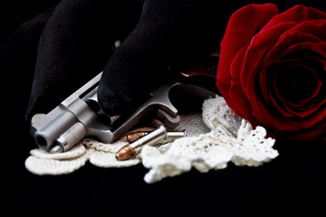 Handgun with rose