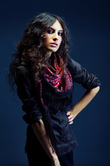 Portrait of a beautiful lady with long curly hair