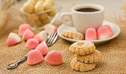 Sweet cookies and coffee.