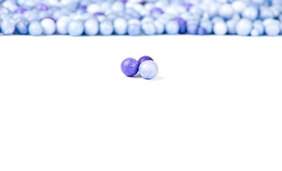 One blue and two violet little pearls