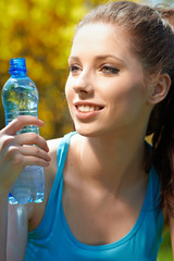 Beautiful Fitness Woman Drinking Water