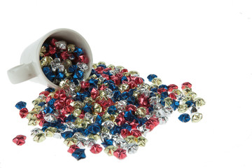 Small cup full with paper stars