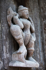 Fototapeta na wymiar Myanmar wood holy sculpture