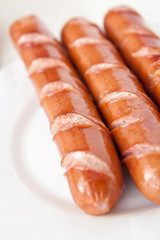 frankfurter sausage hot dog food at plate