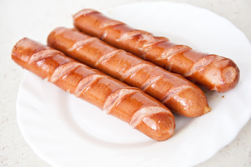 frankfurter sausage hot dog food at plate