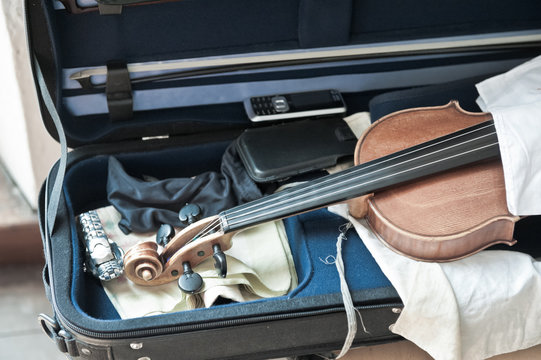 Violin In His Case