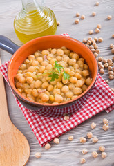Chickpea soup in terracotta bowl. Zuppa di ceci.