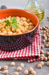 Chickpea soup in terracotta bowl. Zuppa di ceci.