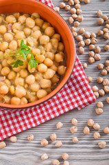 Chickpea soup in terracotta bowl. Zuppa di ceci.