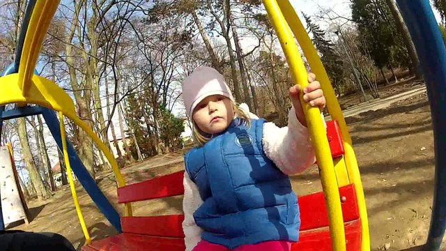 Cute little baby at the swing