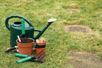 Gardening implements on the grass lawn