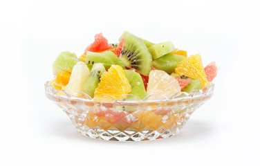 Fresh fruits salad on white background