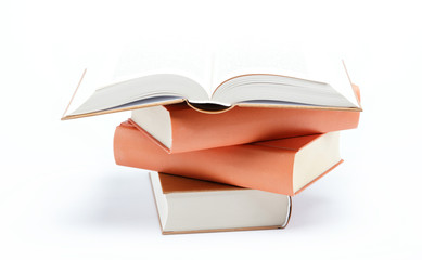 A stack of books on a white background.