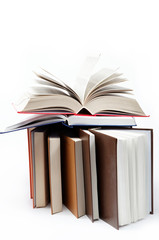 A stack of books on a white background.