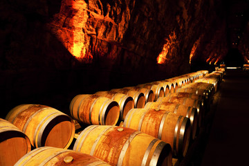 wine barrels in a winery, France